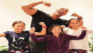 Dwayne Johnson with his three daughters